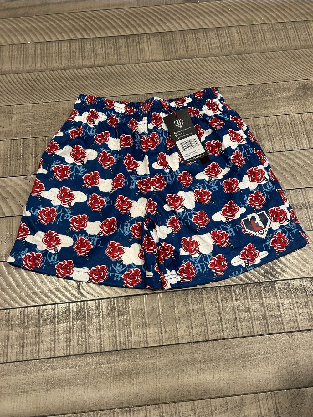 Kids Blue Floral Print Athletic Shorts with Red Accents